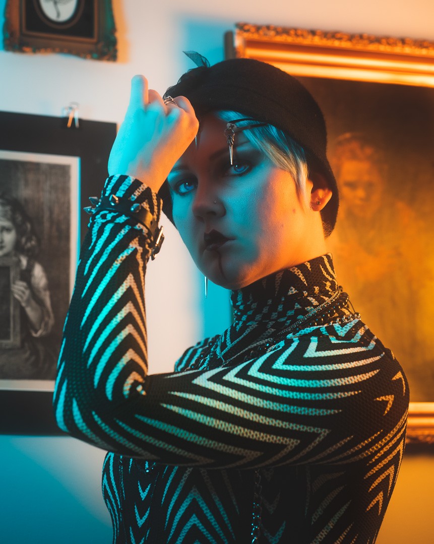 Mx Annix, posing for a photo taken by Sinner Vision
