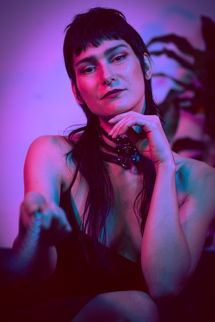 Emily, posing for a photo taken by Sinner Vision