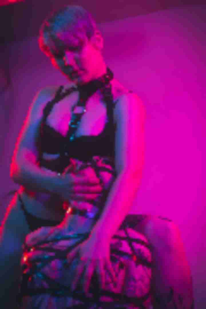 Mx Annix, Leda, posing for a photo taken by Sinner Vision