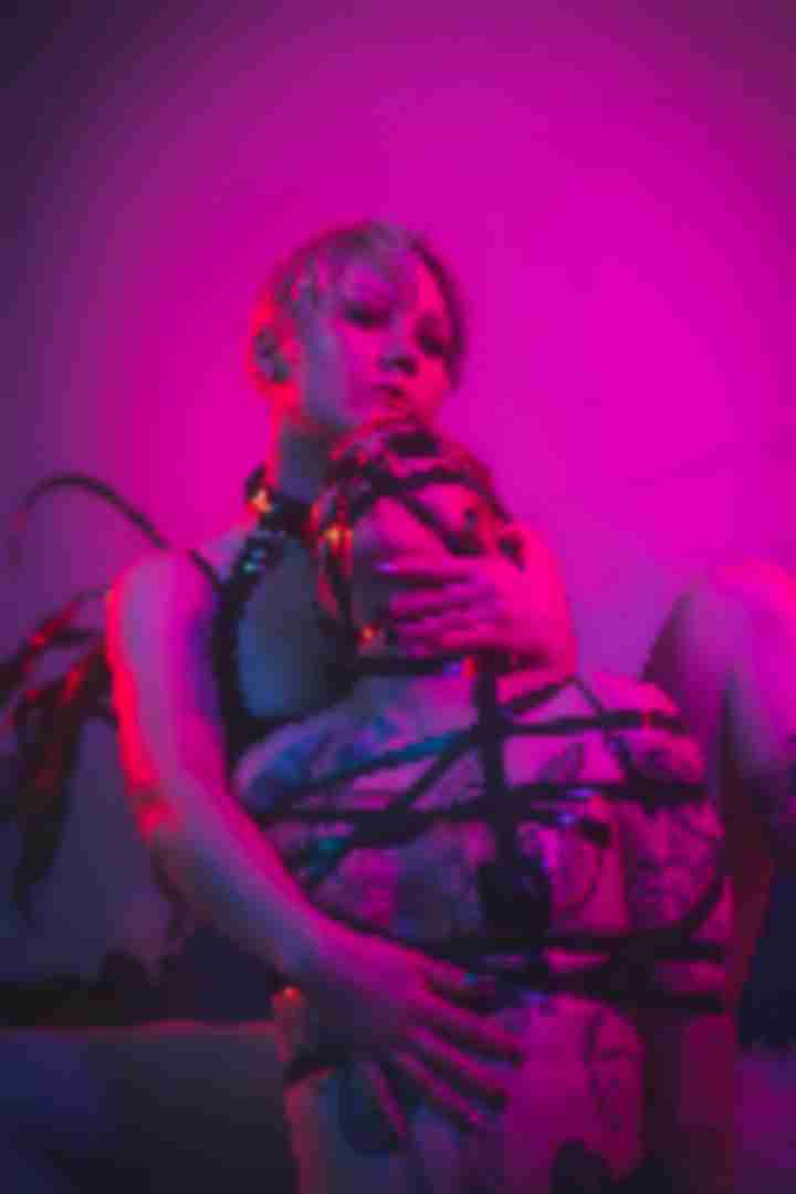 Mx Annix, Leda, posing for a photo taken by Sinner Vision
