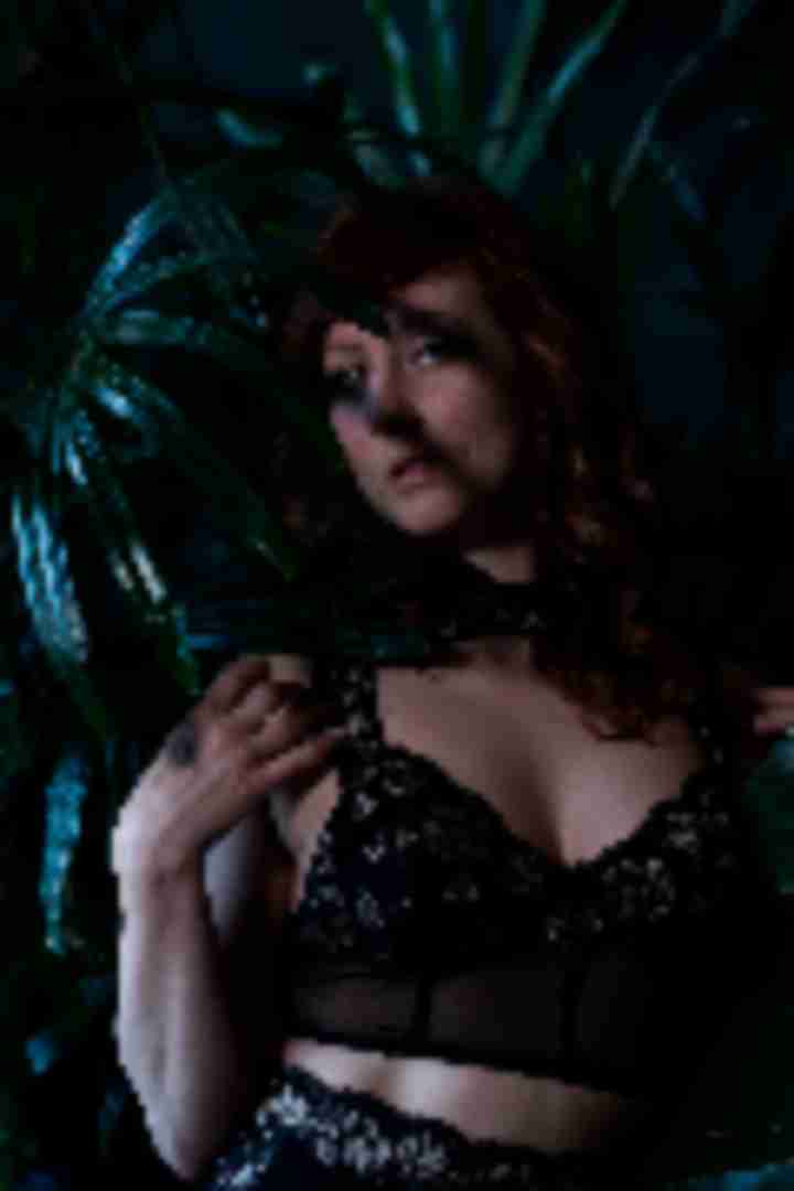 Carissa Mo, posing for a photo taken by Sinner Vision